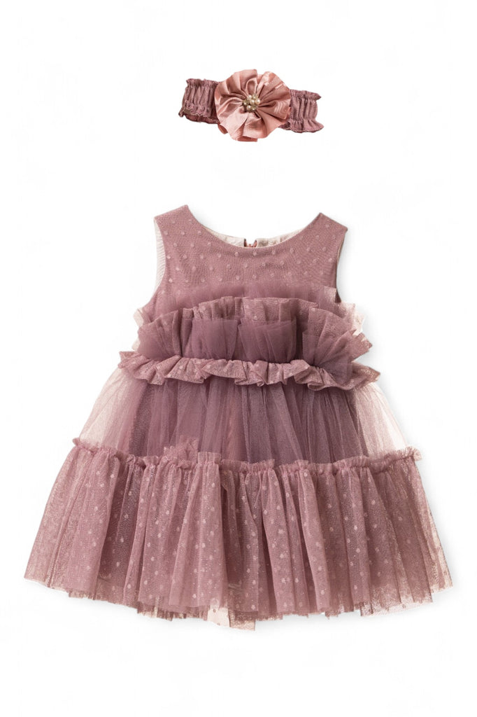 Baby girl purple tulle party dress with ruffles and polka dots, paired with a matching purple headband