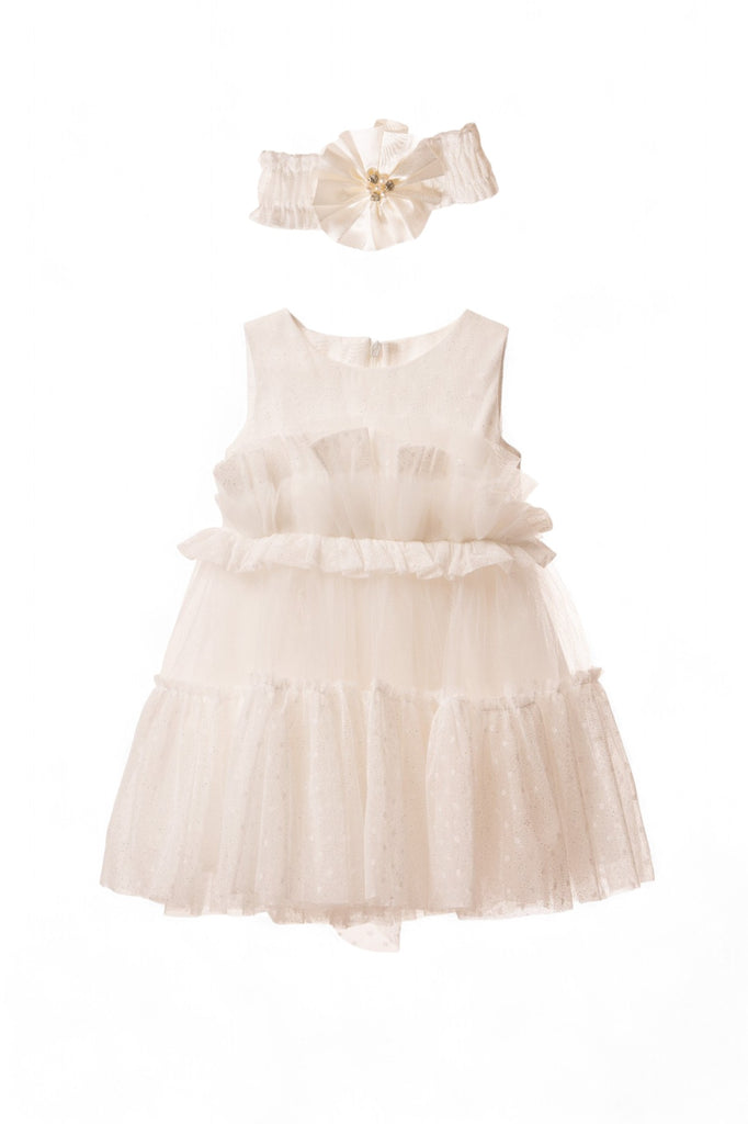 Baby girl white tulle party dress with ruffles and polka dots, paired with a matching white headband