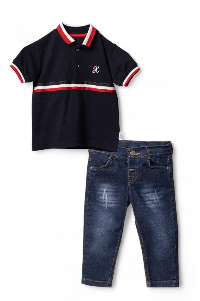 A stylish boy's casual outfit consisting of a navy blue polo shirt with red and white stripes, paired with denim jeans.
